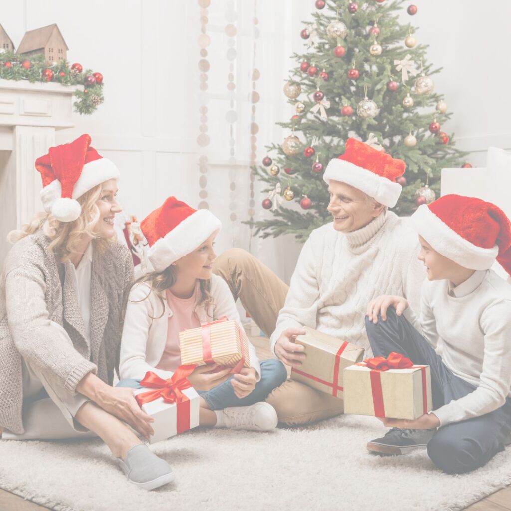 family planning their christmas holiday together with presents and santa hats