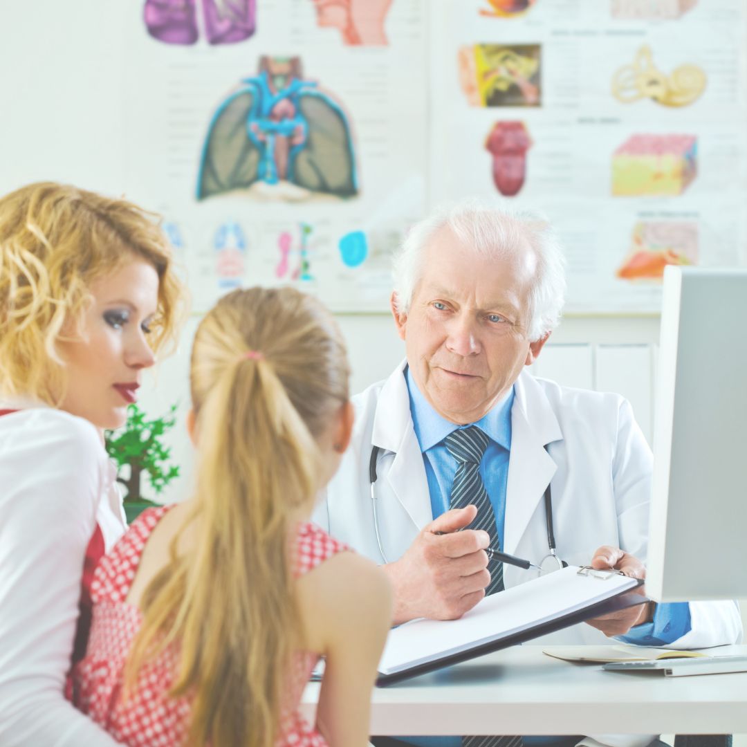 mom and daughter talking with doctor or psychologist